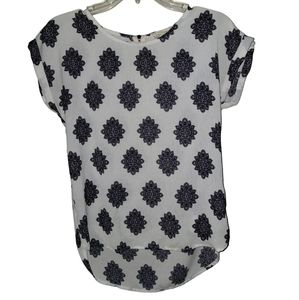 White blouse with violet designs. Size Small